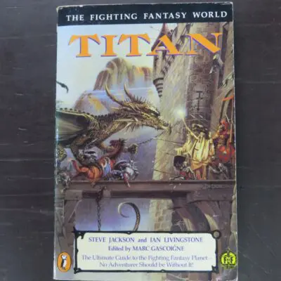 Steve Jackson, Ian Livingstone, Edited by Marc Gascoigne, Titan, The Fighting Fantasy World, Puffin, London, 1989 reprint (1986), paperback, 302 pages, illustrated, 20 cm x 13 cm, Fantasy, Dead Souls Bookshop, Dunedin Book Shop