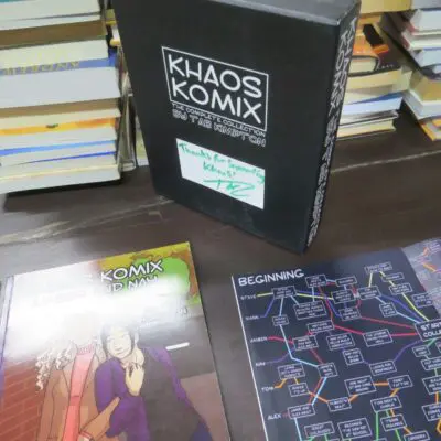 Tab Kimpton, Khaos Komix, The Complete Collection, 4 volume box set, Khaos, UK, 2013-2014, mostly second printings, 4 paperbacks, 68 pages, 87 pages, 71 pages, 109 pages, illustrated + folded broadsheet flowchart + signed certificate of being "Kreature of Khaos" and flat-signed on slipcase by the author, 24 cm x 19 cm  each volume, Literature, Illustration, Graphic Novel, Dead Souls Bookshop, Dunedin Book Shop