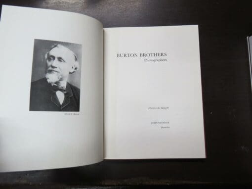 Hardwicke Knight, Burton Brothers Photographers, McIndoe, Dunedin, 1980, hardback, lacking dustjacket, 140 pages, illustrated, 29 cm x 22 cm, New Zealand Photography, Photography, Dunedin, Dead Souls Bookshop, Dunedin Book Shop  Condition - staining, soiling, fading, sunning, scuffing, creasing, bumping, rubbing, age-toning to boards, foxing, age-toning, soiling, rubbing to prelims and fore-edges of textblock, soiling to half-title, 